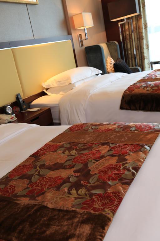Guangzhou Changfeng Gloria Plaza Hotel Стая снимка