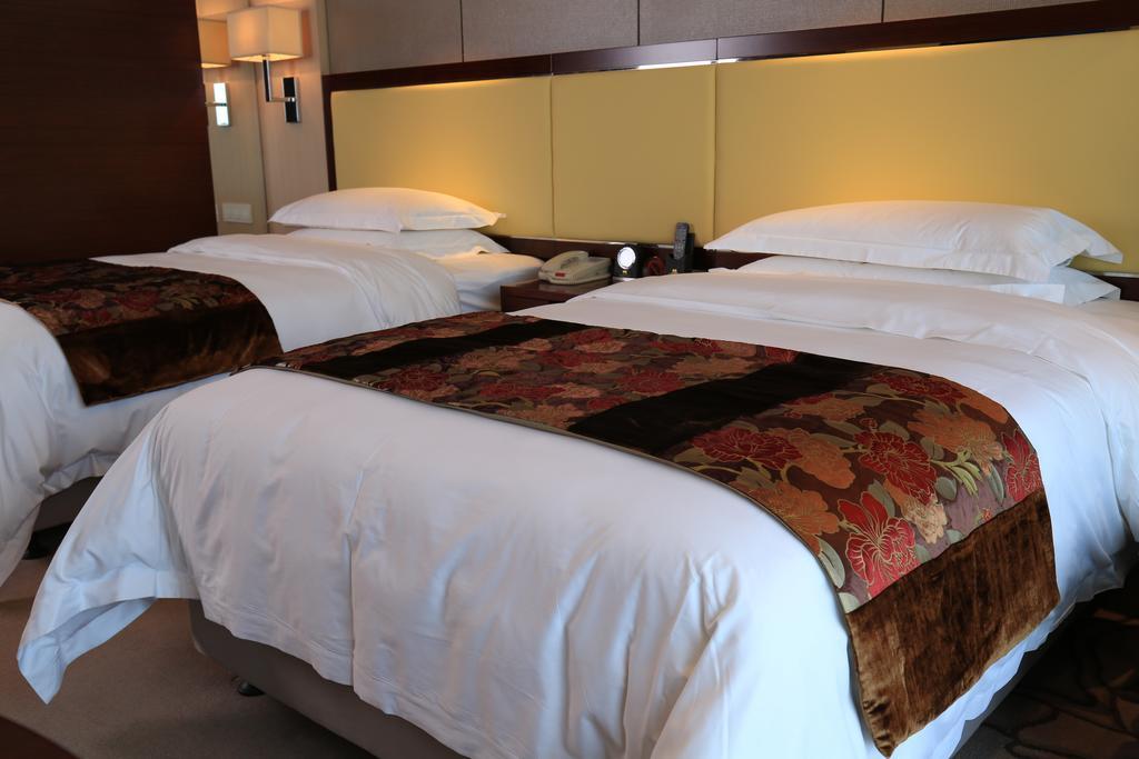Guangzhou Changfeng Gloria Plaza Hotel Стая снимка